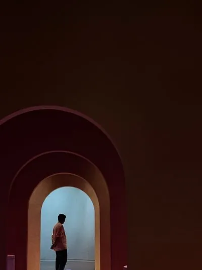 Photograph of a solitary figure from the No One Is Watching series by Mo Badawi
