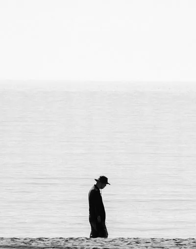 Photograph of a solitary figure from the No One Is Watching series by Mo Badawi